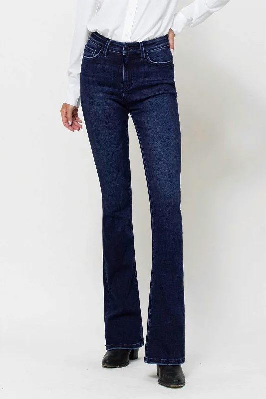 Travel Essentials Come Closer Mini Flare Jeans In Dark Blue